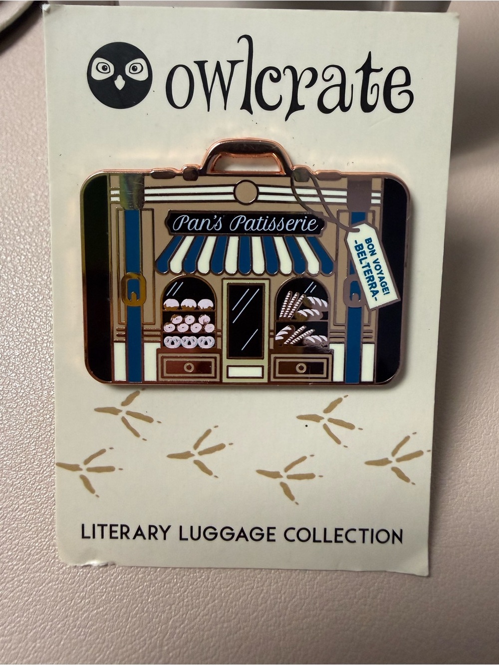OwlCrate Literary Luggage Enamel Pin - Serpent & Dove (Pan's Patisserie)